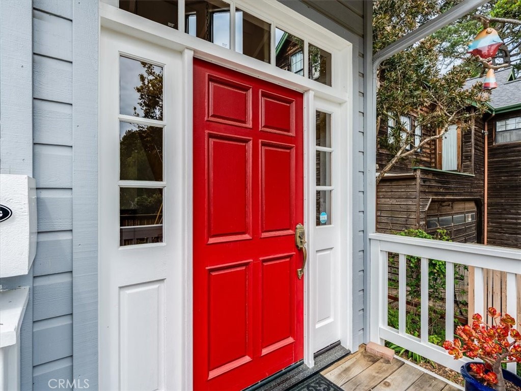 1810 Melrose Avenue Cambria, CA 93428 - Photo 5 of 74 a view of a red door of the house