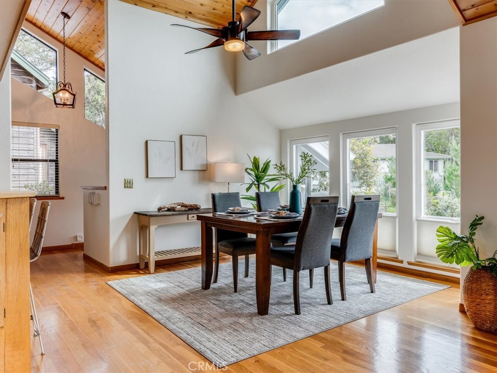 1810 Melrose Avenue Cambria, CA 93428 - Photo 9 of 74 a view of a dining room with furniture window and wooden floor