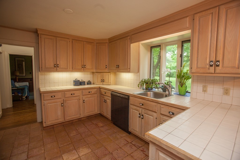 14 Dover Road Dover, MA 02030 - Photo 12 of 20 a kitchen that has a sink and a stove in it