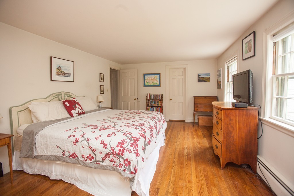 14 Dover Road Dover, MA 02030 - Photo 15 of 20 a bedroom with a bed and a flat screen television