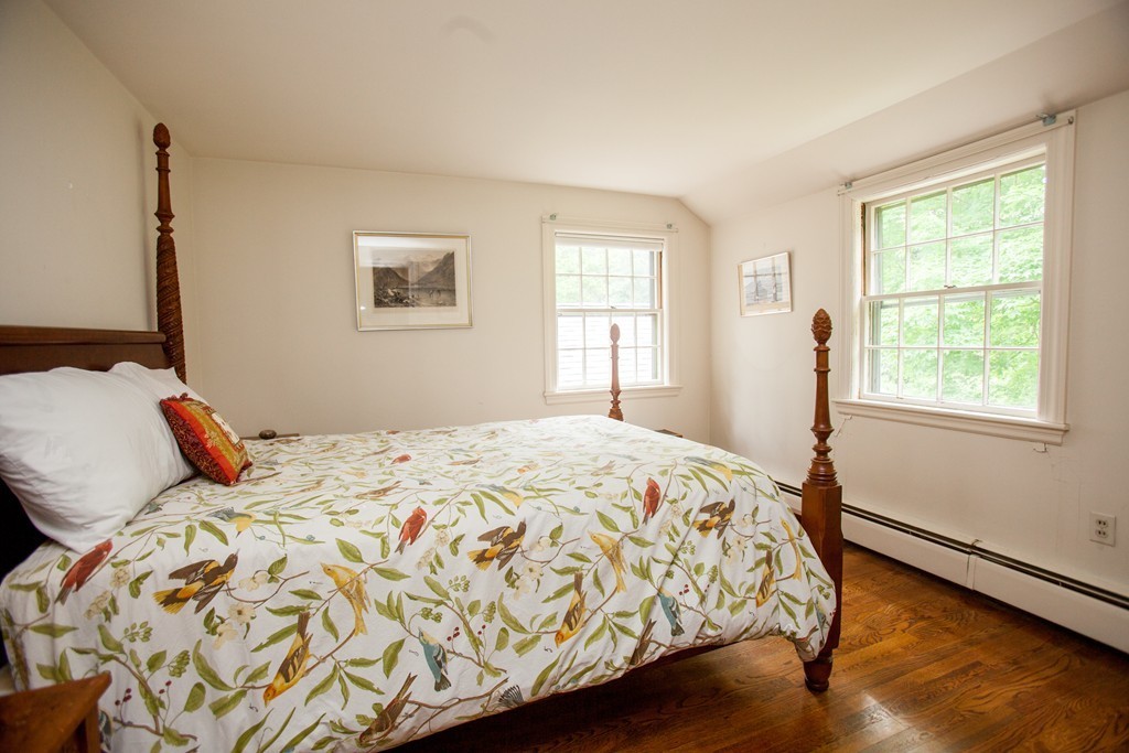 14 Dover Road Dover, MA 02030 - Photo 17 of 20 a bedroom with a bed and a window