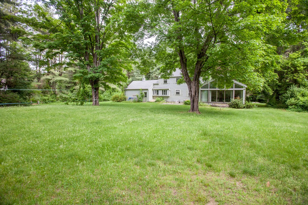 14 Dover Road Dover, MA 02030 - Photo 20 of 20 a view of a house with a big yard and large trees