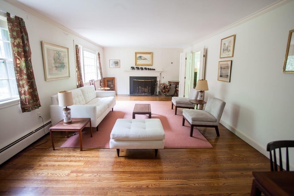 14 Dover Road Dover, MA 02030 - Photo 5 of 20 a living room with furniture and a fireplace