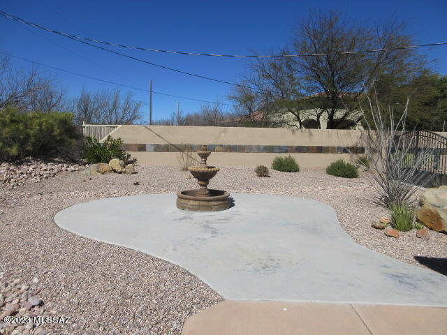511 Camino Hombre De Oro Rio Rico, AZ 85648 - Photo 4 of 44 a view of a fountain of the house