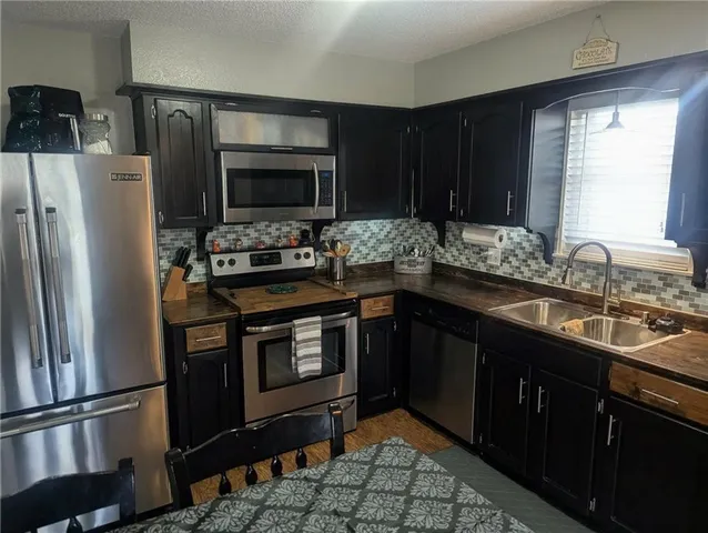 $329,900 | 308 Southwest Moore Place, Blue Springs, MO 64015