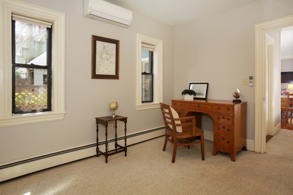 43 Russell Street, Unit 1 Boston, MA 02129 - Photo 4 of 6 a work room with furniture and windows