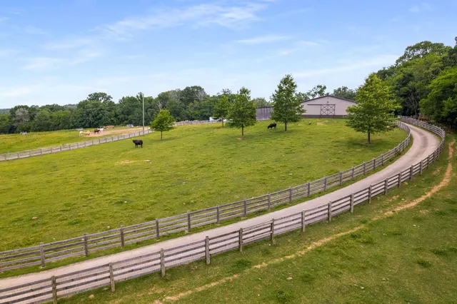 a view of a lake with a yard