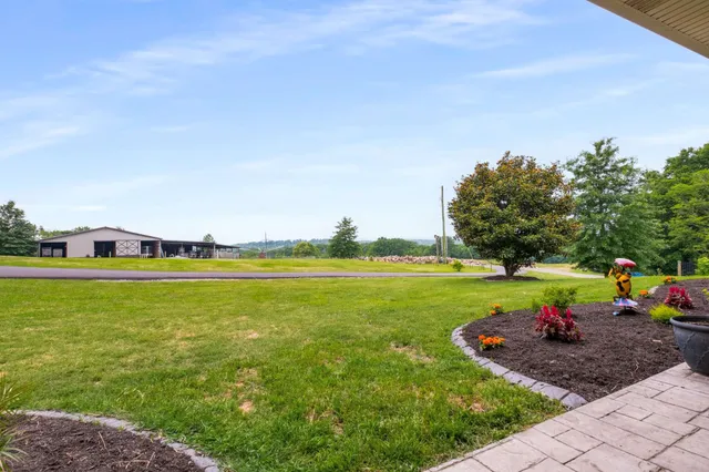 a view of a lake with a big yard