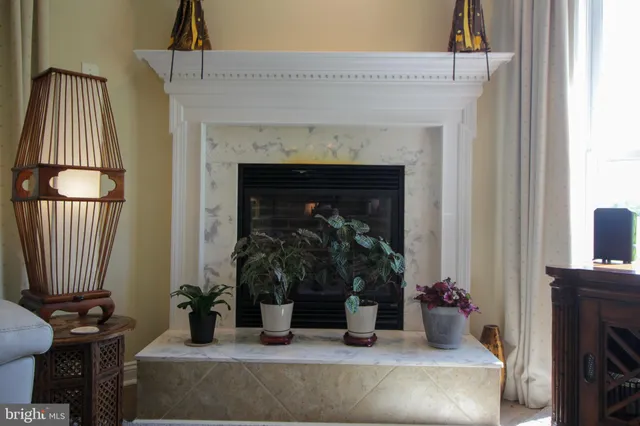 a view of a dining table and chairs in the roof deck
