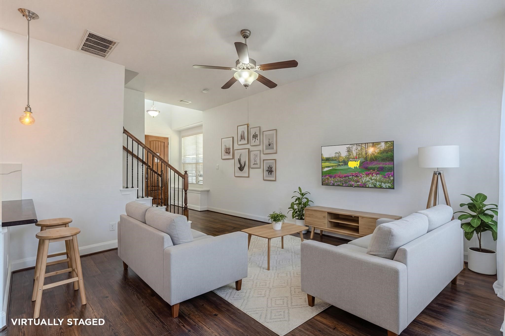 58 Aventura Place Spring, TX 77389 - Photo 12 of 23 a living room with furniture and a wooden floor
