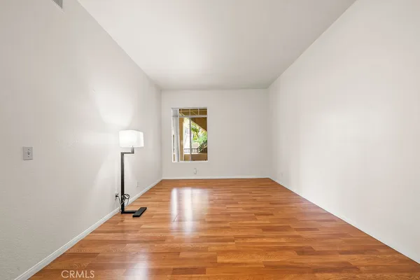 a view of an empty room and window