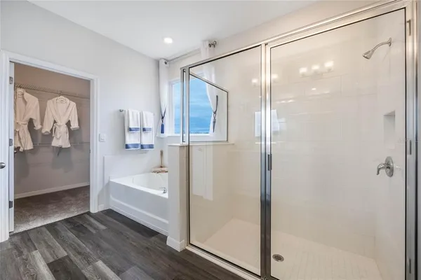 a bedroom with a bed and a cabinets