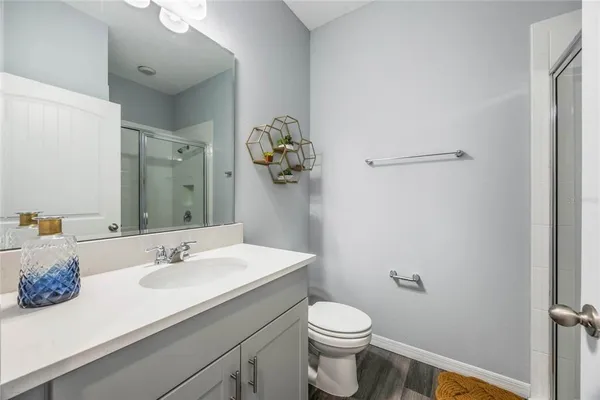 a view of room with window and hardwood floor