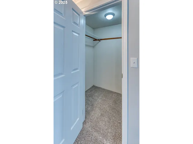 a view of a room with door open