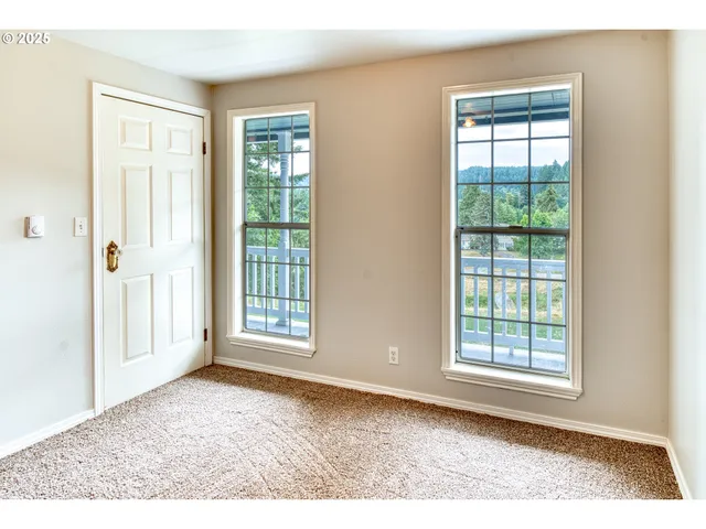 a view of a room that has a window in it