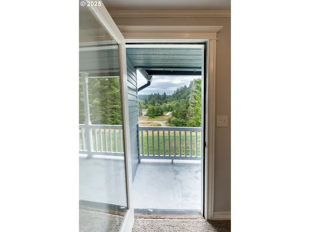 a view of a backyard with a wooden deck