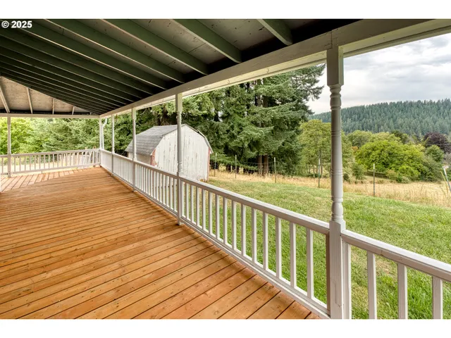 a view of a house with a yard and pool