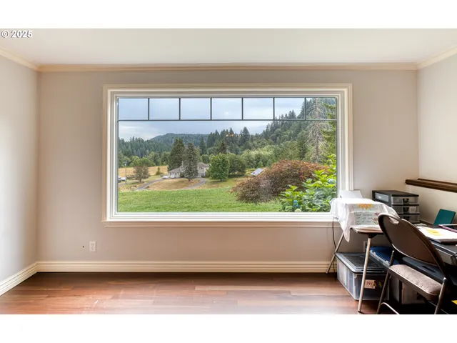 a view of a room that has a window in it