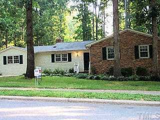517 Dartmouth Road Raleigh, NC 27609 - Photo 1 of 1 a front view of a house with a yard