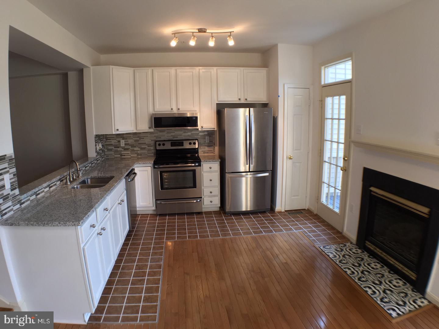 2235 Village Square Road Frederick, MD 21701 - Photo 10 of 25 Kitchen w/fireplace