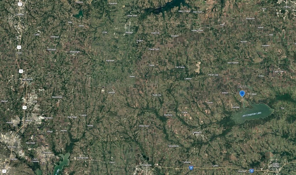 0 County Road 2105 Cooper, TX 75432 - Photo 7 of 7 a aerial view of a house with lots of trees