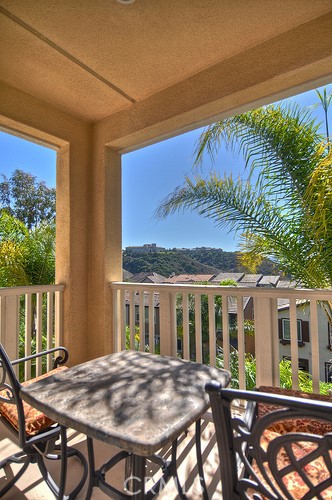 10 Prescott Aliso Viejo, CA 92656 - Photo 16 of 29 a view of a patio with a table and chairs