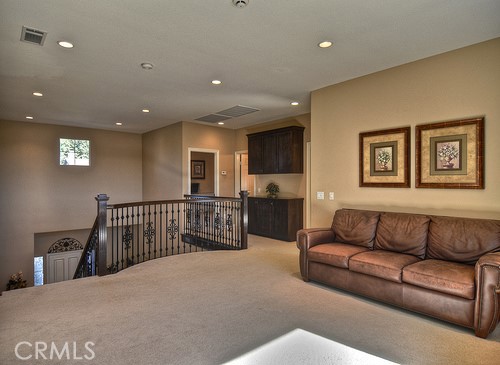 10 Prescott Aliso Viejo, CA 92656 - Photo 26 of 29 a view of a living room kitchen and a window