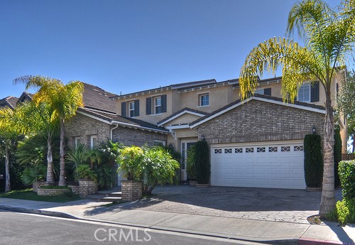 10 Prescott Aliso Viejo, CA 92656 - Photo 27 of 29 a front view of house with a garden