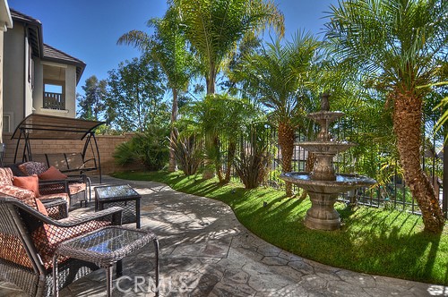 10 Prescott Aliso Viejo, CA 92656 - Photo 6 of 29 a view of a patio with table and chairs and potted plants