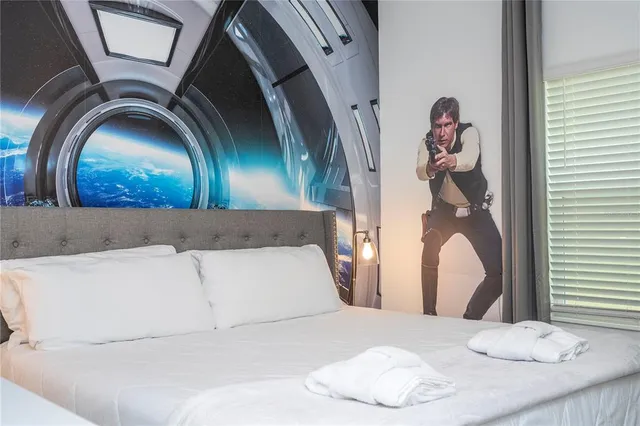 a dining room with furniture and window