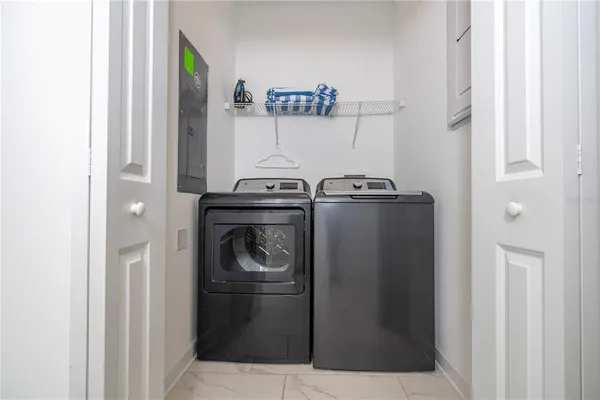 a bedroom with a bed and a mirror