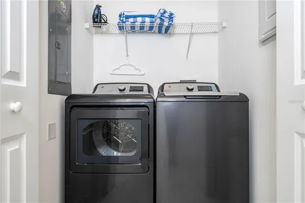 a bathroom with a bathtub and a table