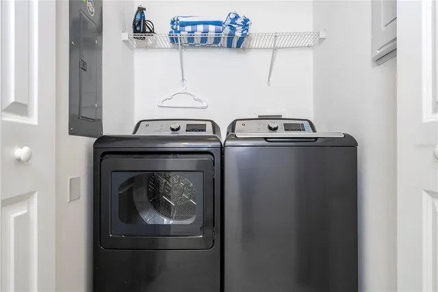 a bathroom with a bathtub and a table