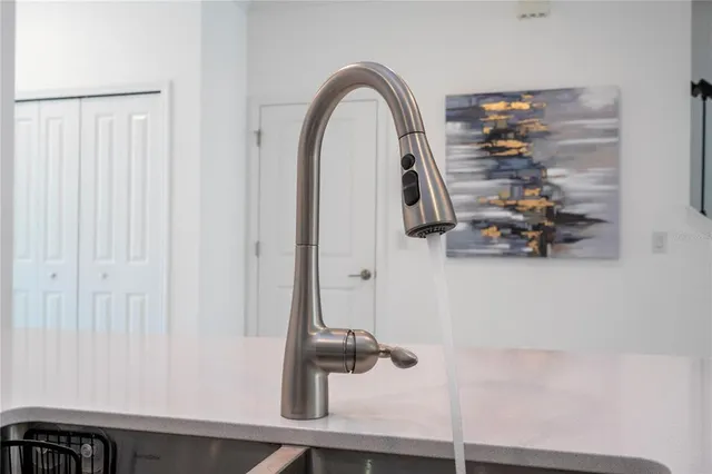 a spacious bedroom with a bed and a couch