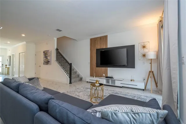 a view of swimming pool with outdoor seating