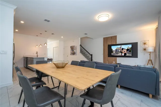 aerial view of a house with a lake view