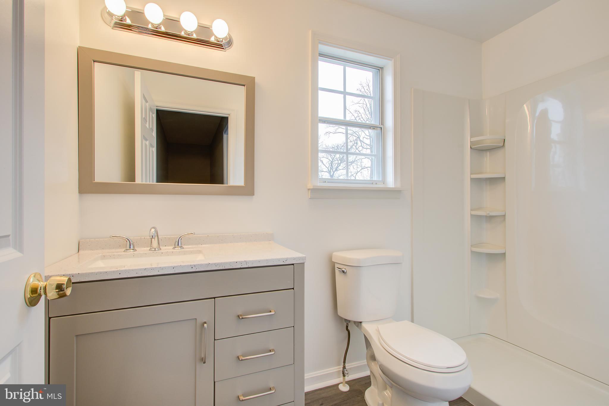 7503 Plainview Road Baltimore, MD 21237 - Photo 27 of 39 "All New Full Bathroom between the Bedrooms"