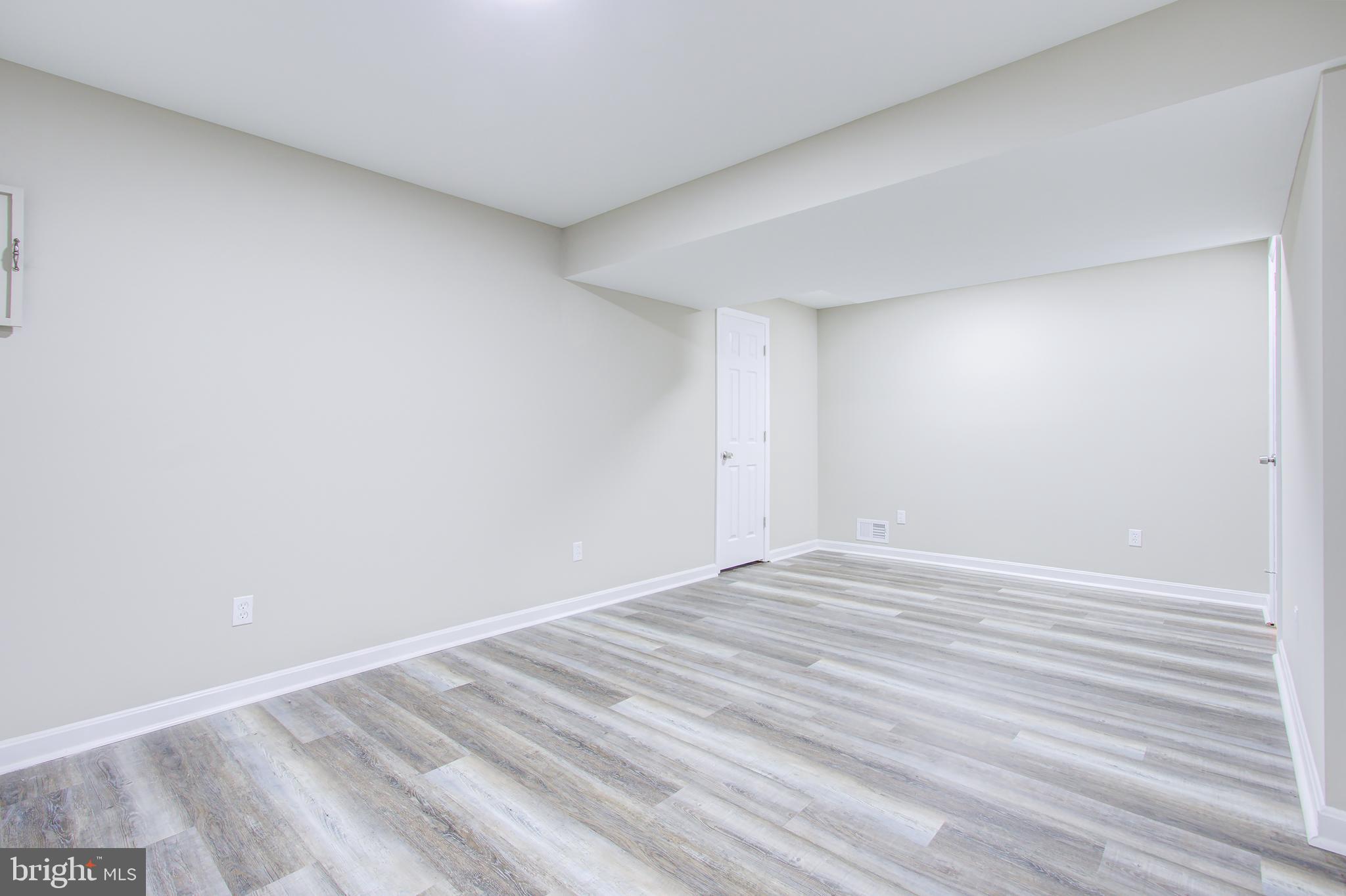 7503 Plainview Road Baltimore, MD 21237 - Photo 33 of 39 "Features New Laminate Flooring & Paint"