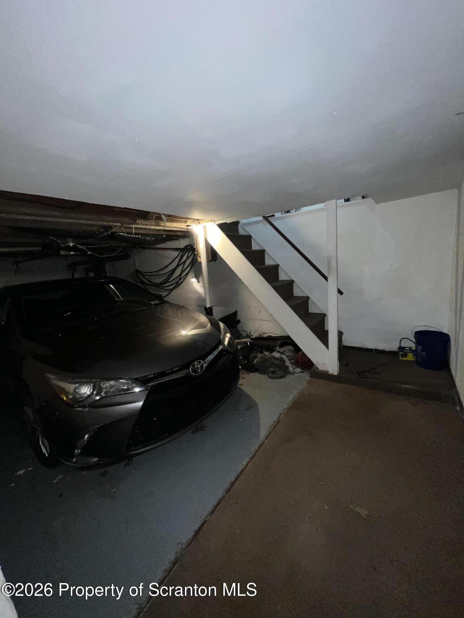 218 Lake Scranton Road Scranton, PA 18505 - Photo 16 of 19 a car parked in the middle of a room