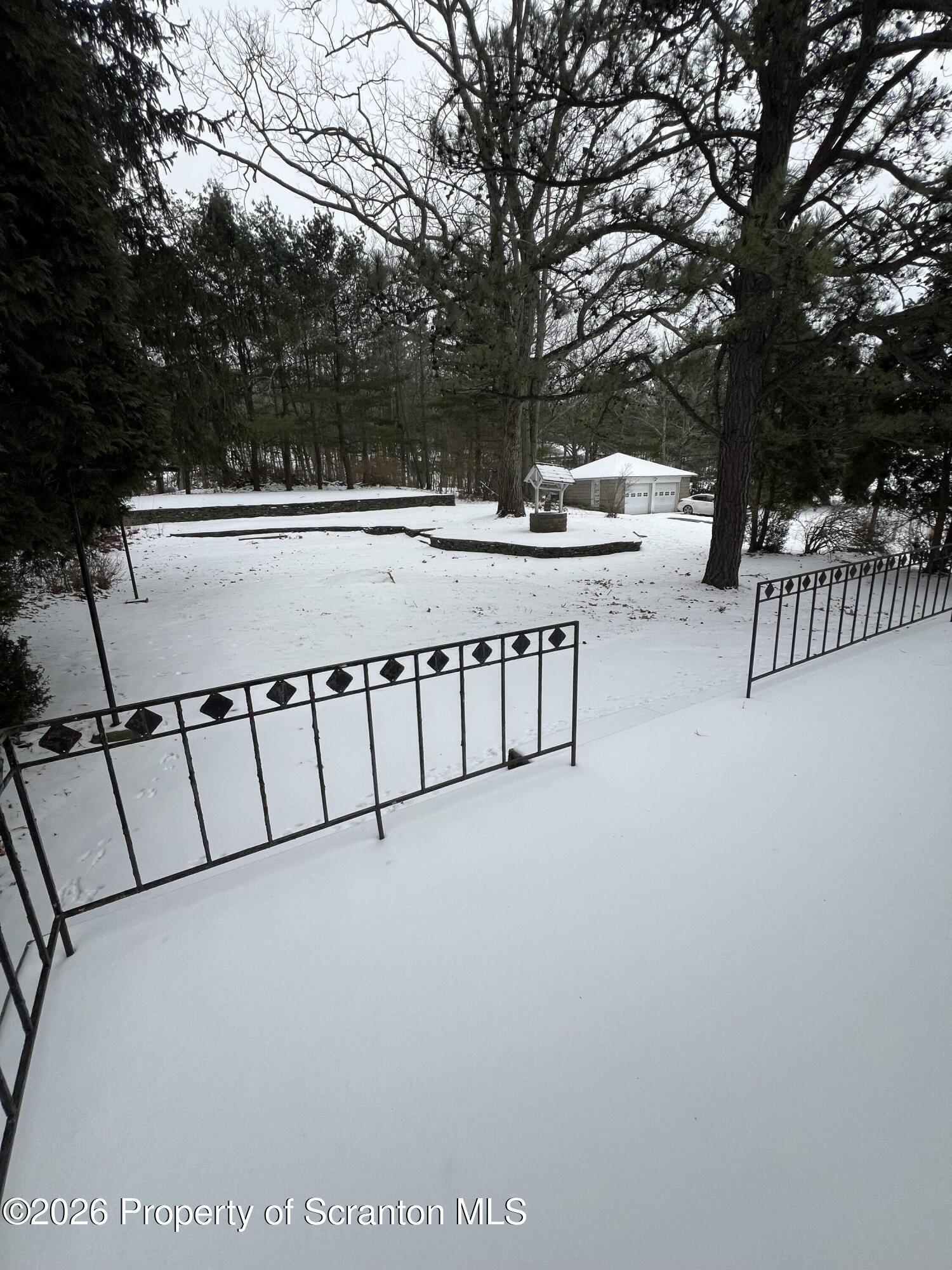 218 Lake Scranton Road Scranton, PA 18505 - Photo 17 of 19 a view of a terrace with a bench