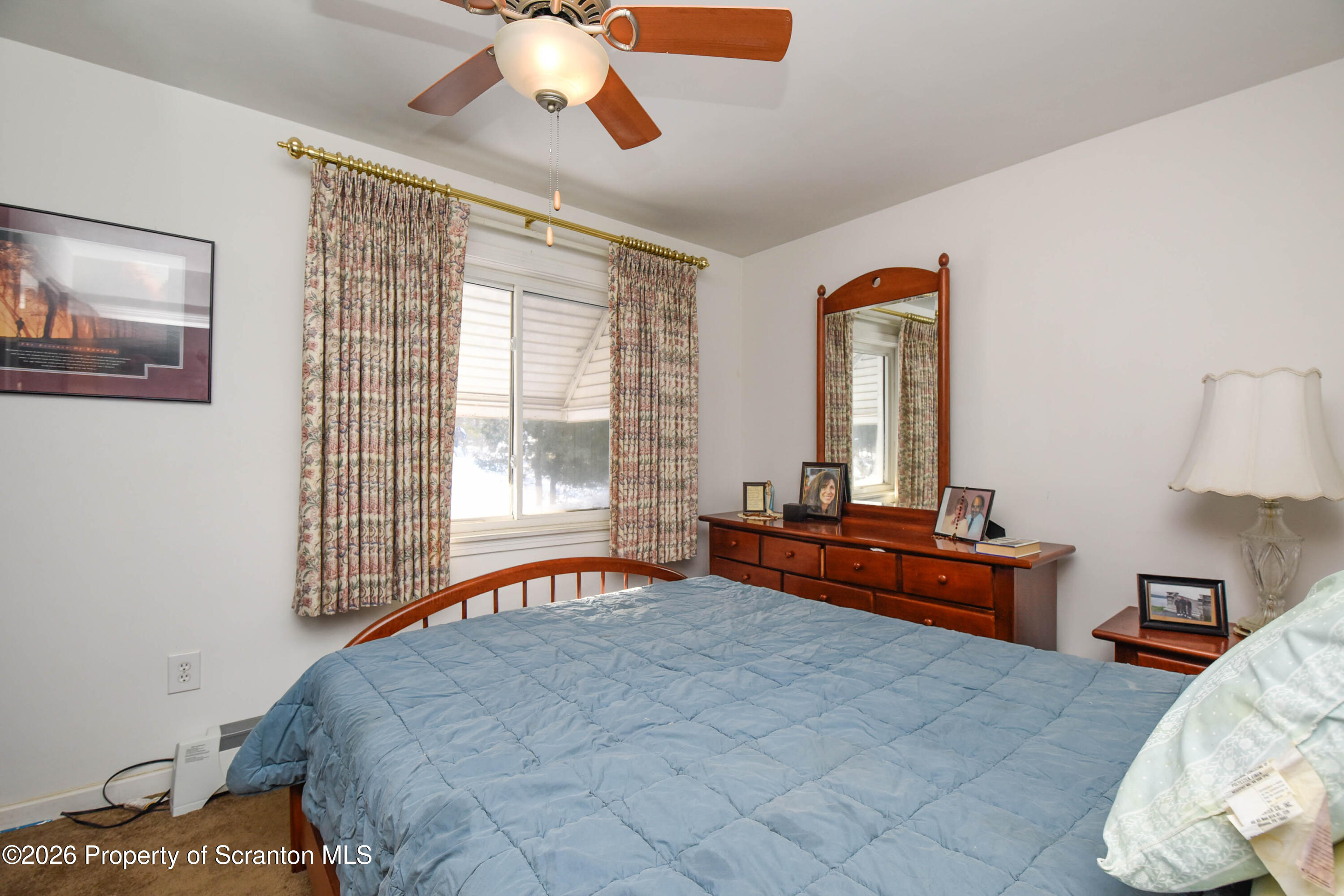 218 Lake Scranton Road Scranton, PA 18505 - Photo 19 of 45 a bedroom with furniture and a large window