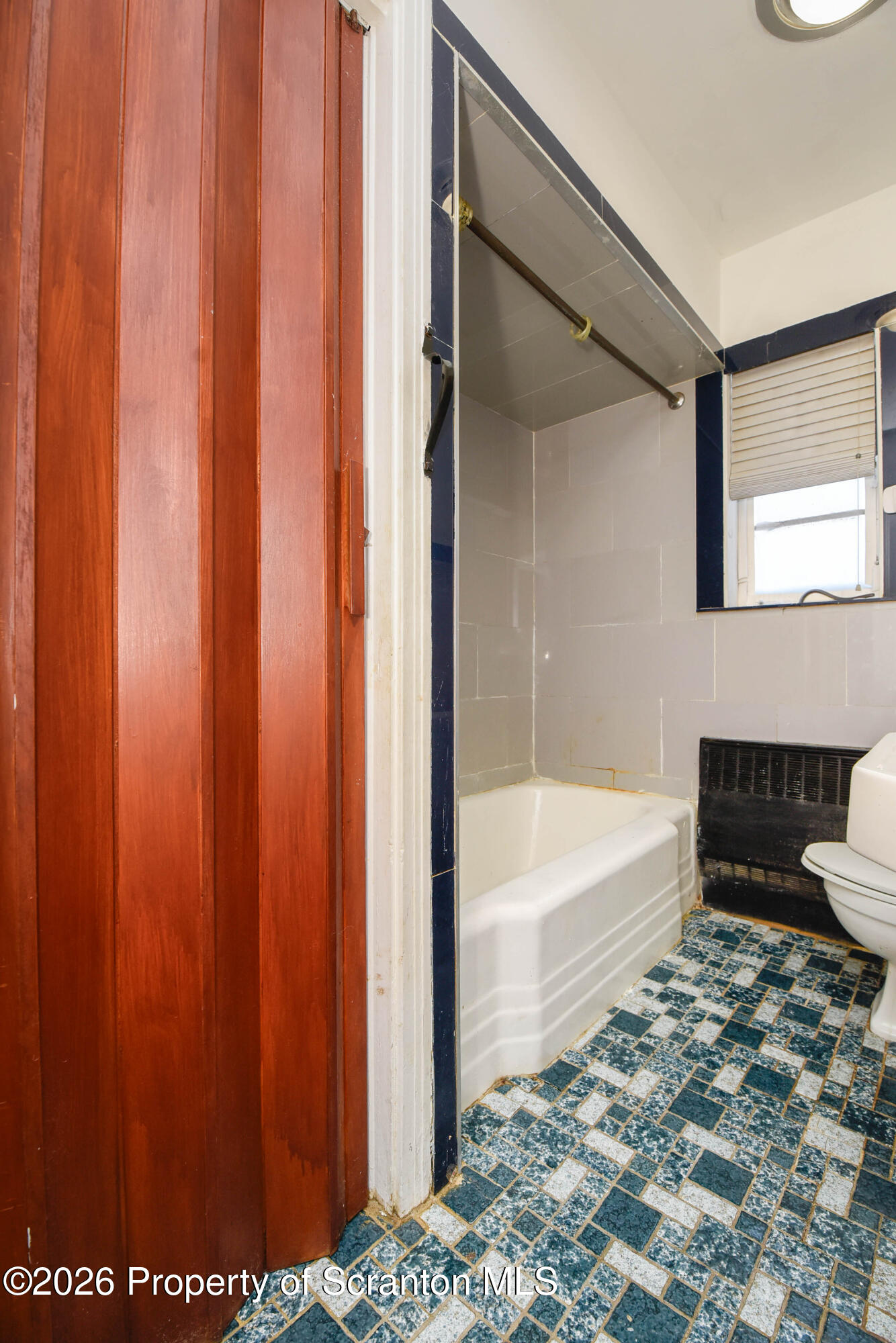 218 Lake Scranton Road Scranton, PA 18505 - Photo 23 of 45 a bathroom with bathtub and a shower