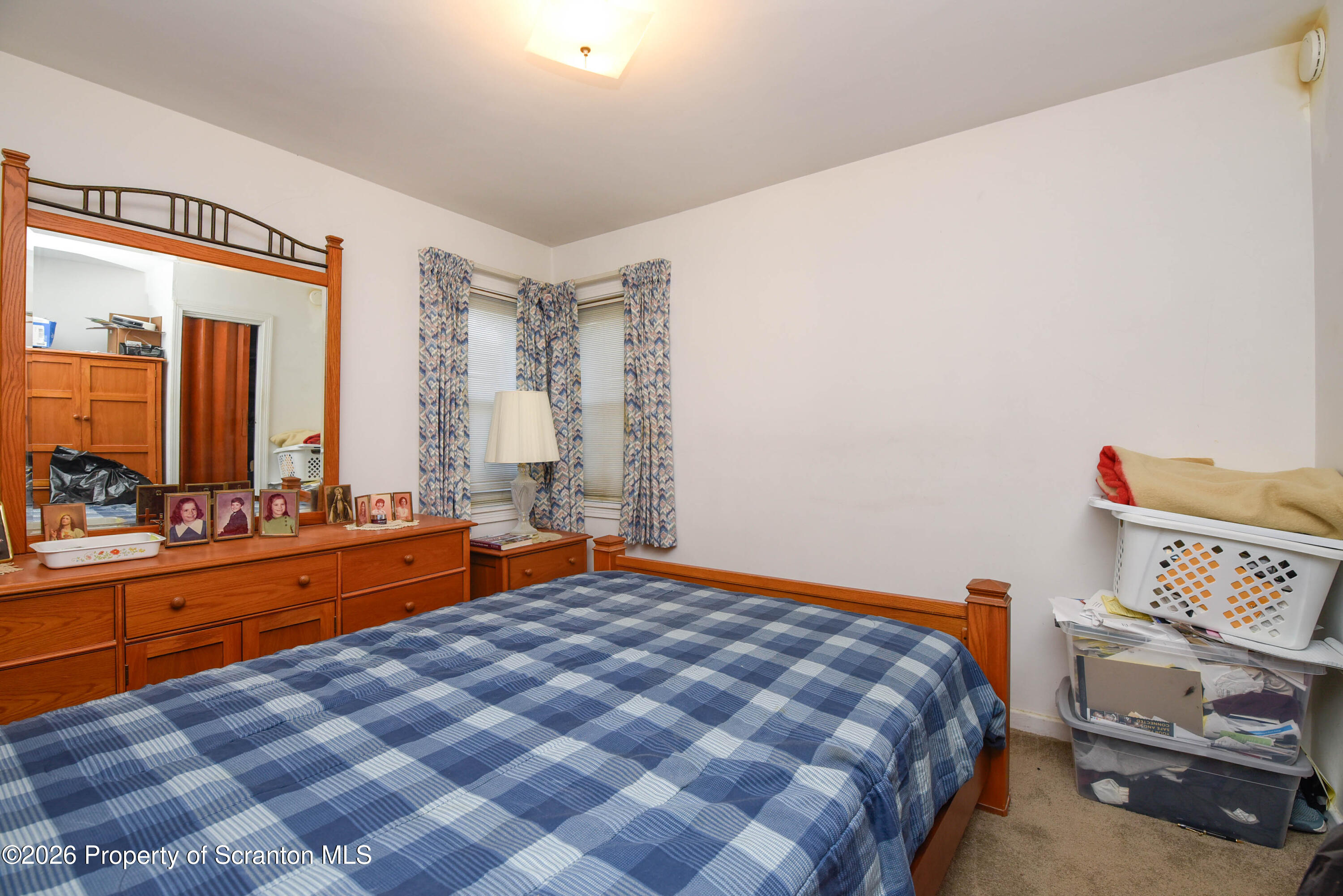 218 Lake Scranton Road Scranton, PA 18505 - Photo 25 of 45 a bedroom with a bed and a large window