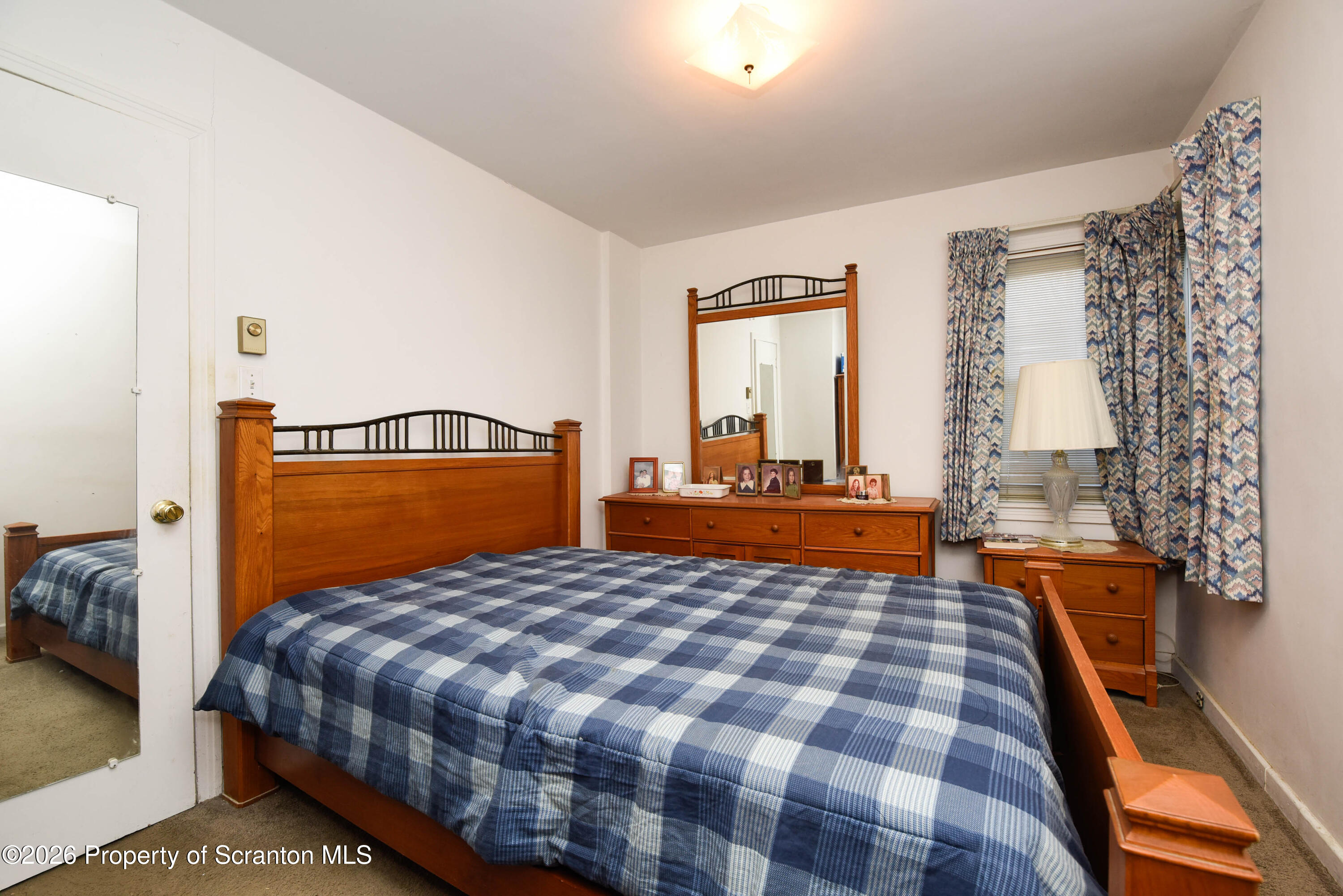 218 Lake Scranton Road Scranton, PA 18505 - Photo 27 of 45 a bedroom with a bed and window