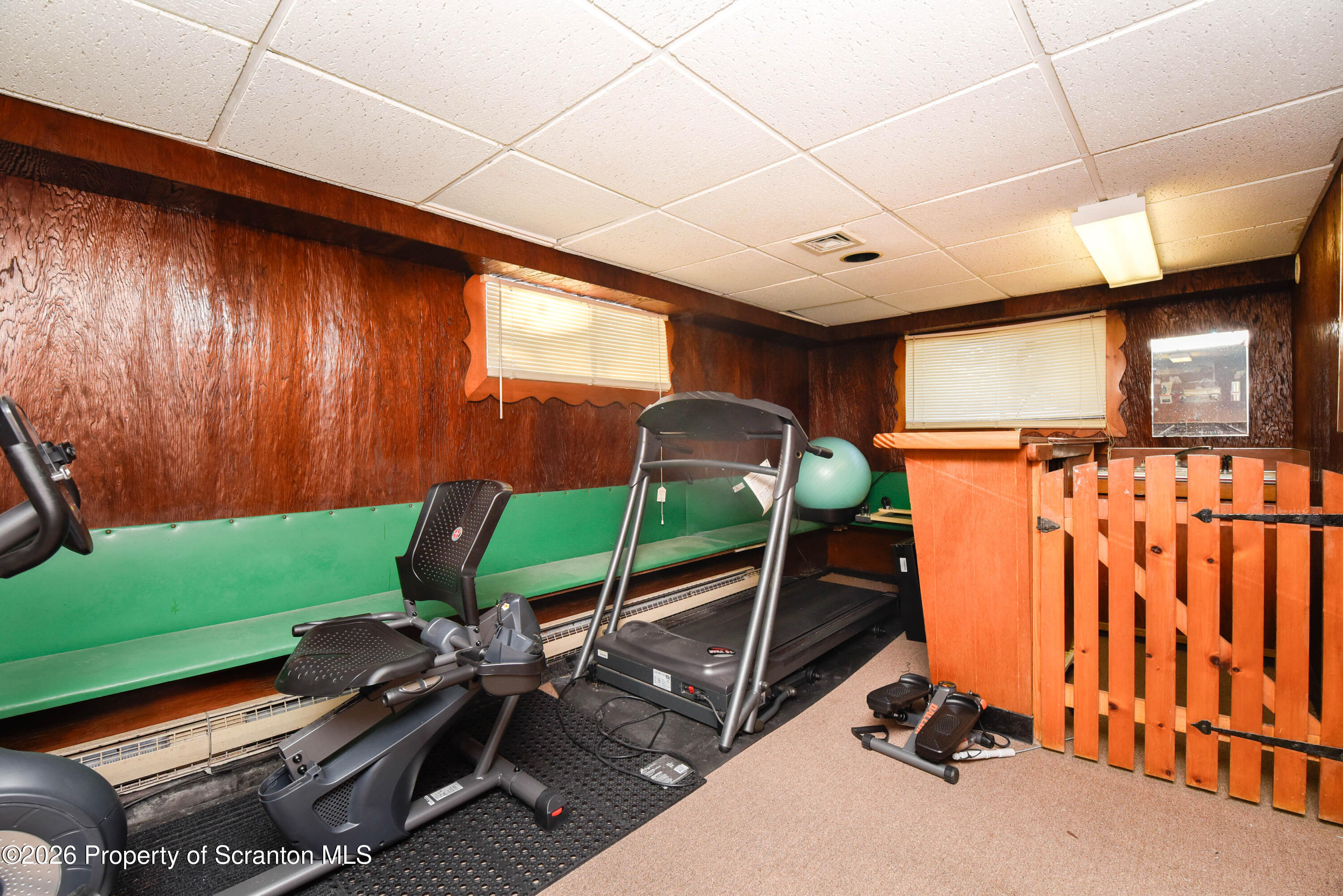 218 Lake Scranton Road Scranton, PA 18505 - Photo 38 of 45 a room with gym equipment and a large window