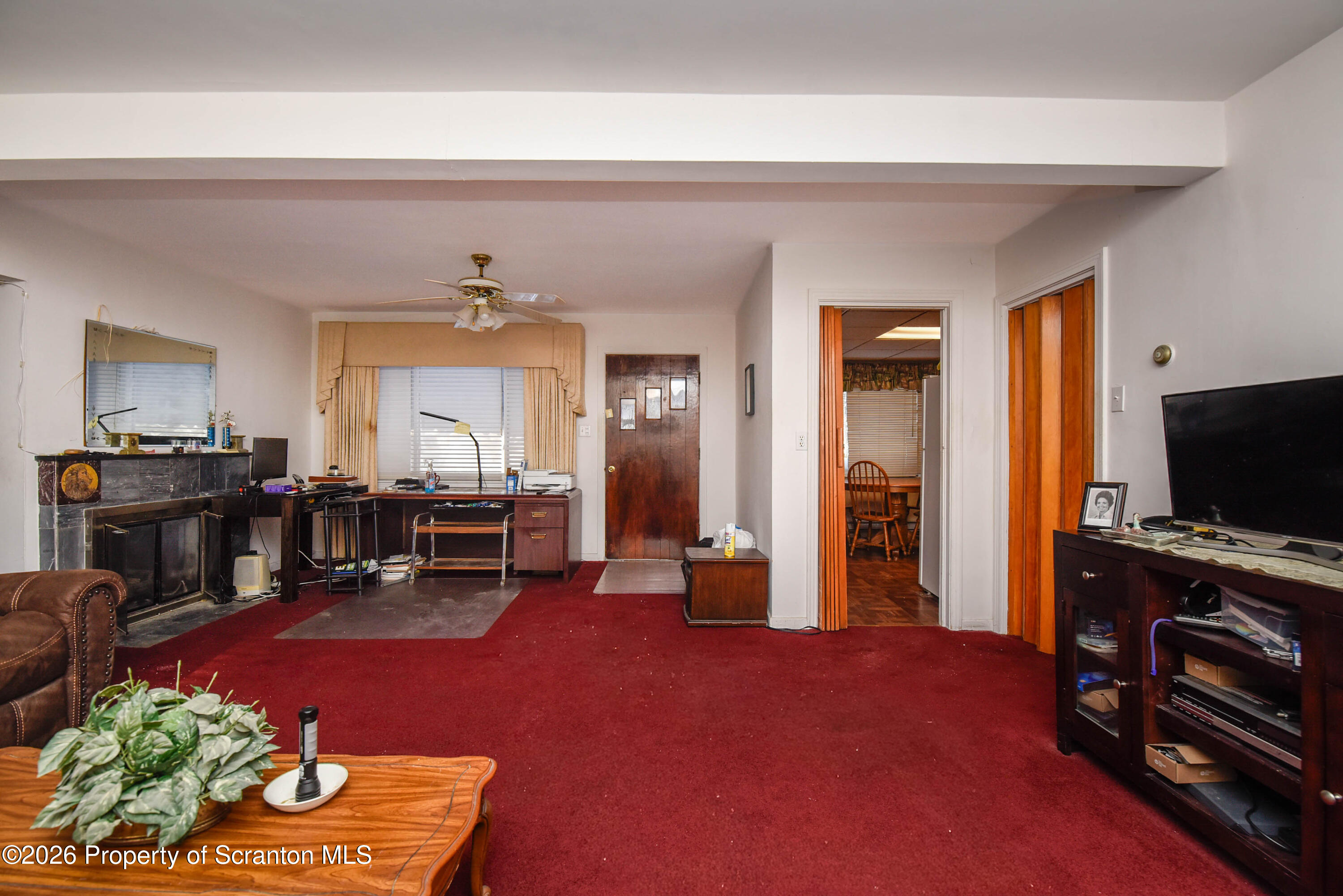 218 Lake Scranton Road Scranton, PA 18505 - Photo 9 of 45 a living room with furniture and a flat screen tv