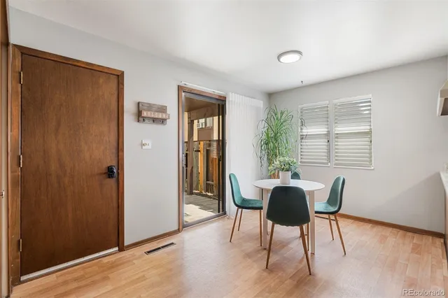 a workspace with furniture and a window