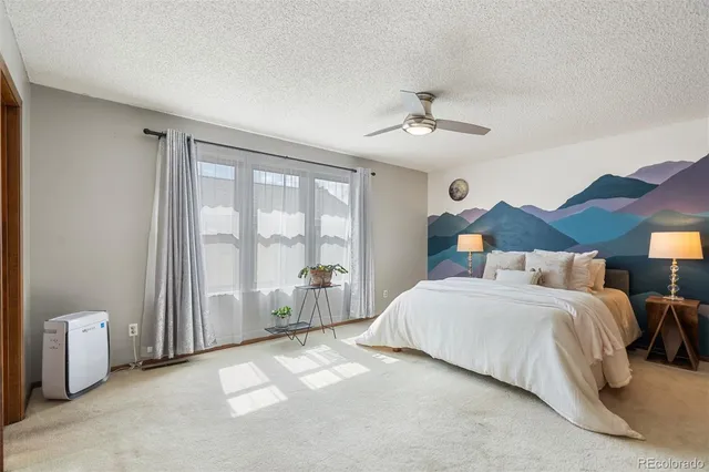 a view of a swimming pool with a lounge chairs