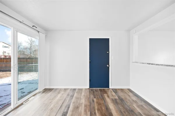 a view of an empty room and window