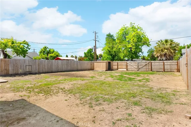 an aerial view of residential building and lake